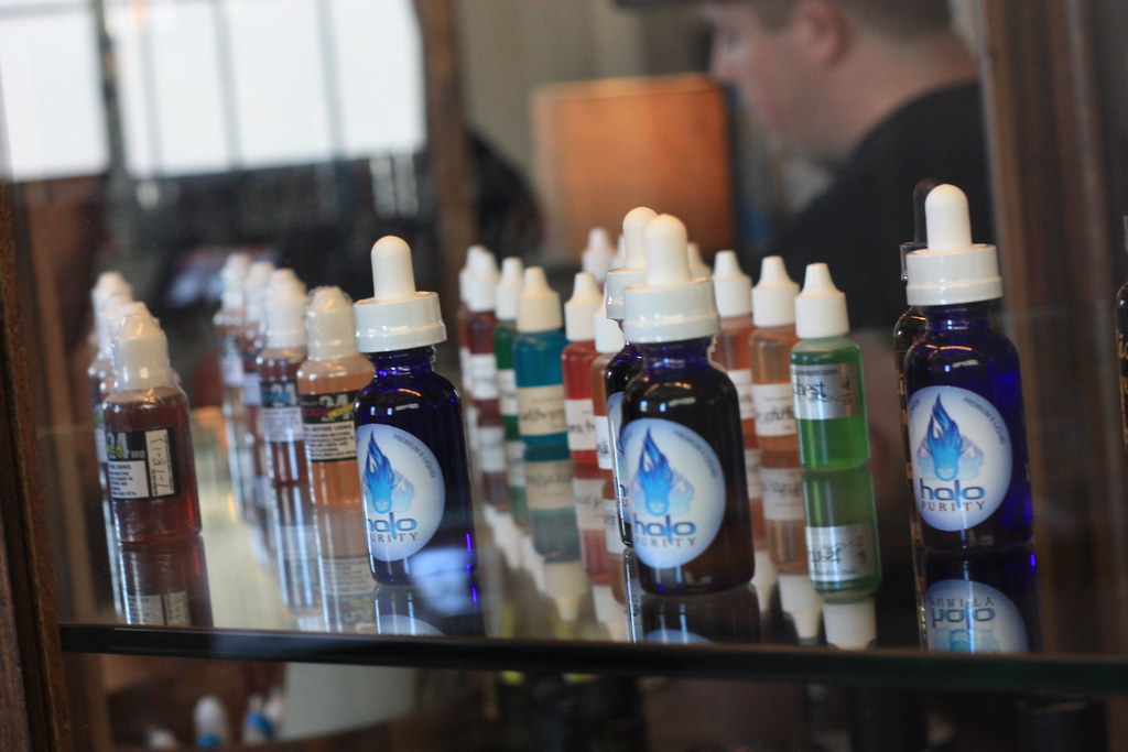 E-liquid bottles on display at a vape shop